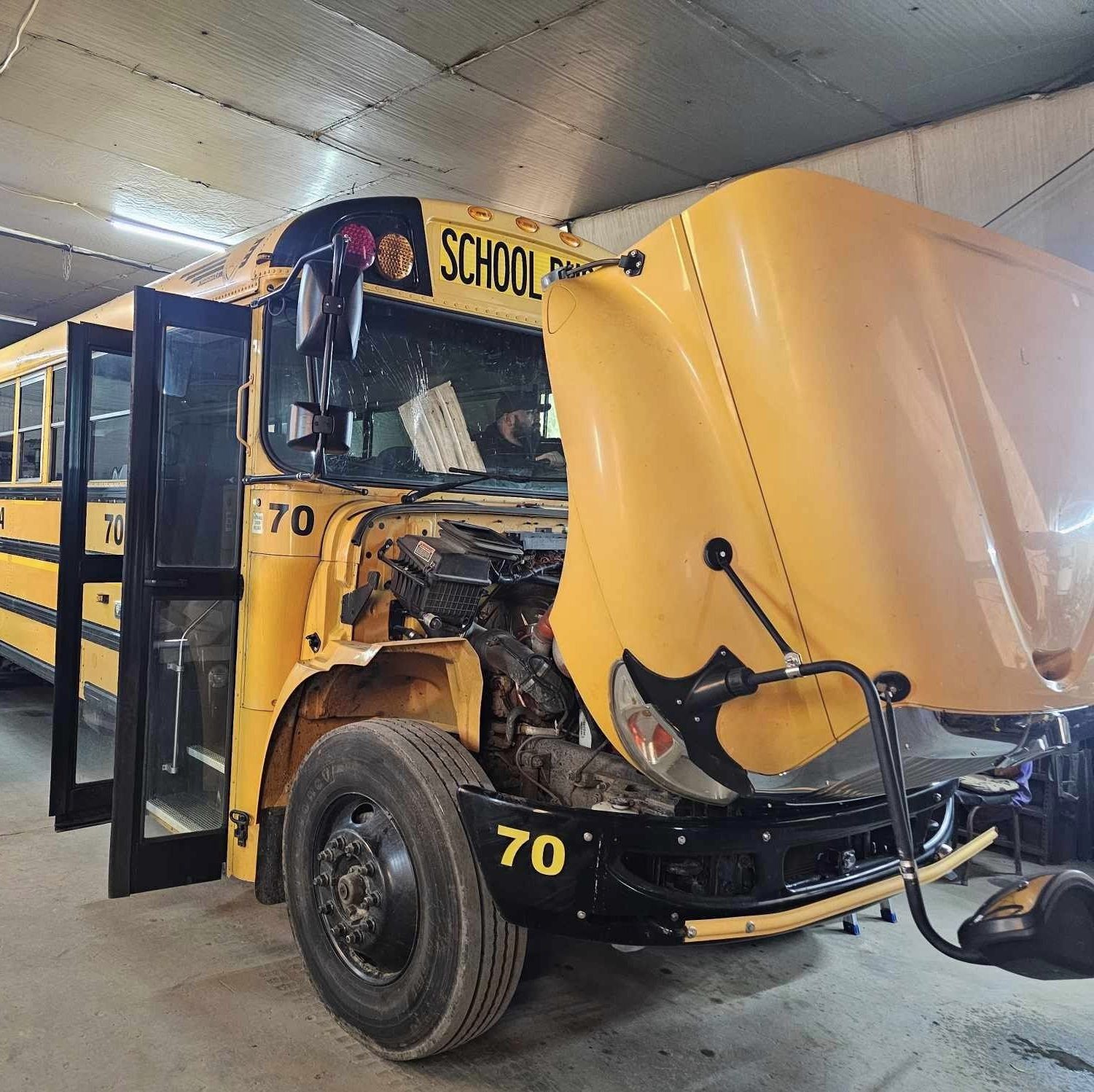 school bus with cracked windshield